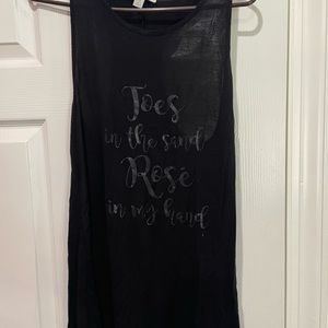 It says” toes in the sand, rose’ in my hand”